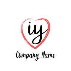 IY initial handwriting in a love brush-shaped template