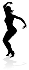 A woman dancer dancing in silhouette
