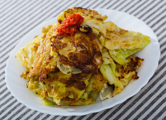 Close up of vegetarian dish  of leaves of cabbage  in batter