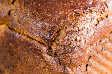 a whole loaf of black rye bread