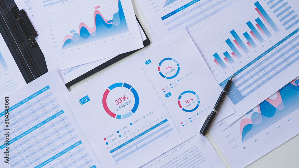 Aufkleber businessman working calculate data document graph chart report marketing research development planni