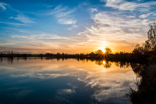 Sunset on a lake in south of Toulouse, France
