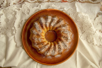 delicious homemade cupcake on a textile background
