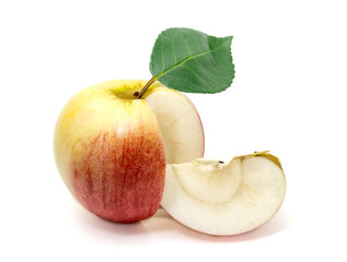 Apple with a leaf and small slice at the side