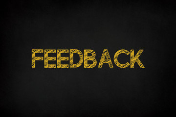 Feedback word on chalkboard background