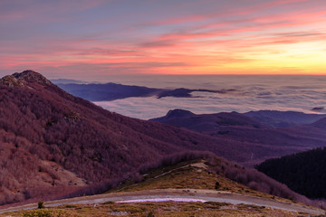 Beautiful sunrise with colored orange sky (Montseny Natural Park, Catalonia, Spain)