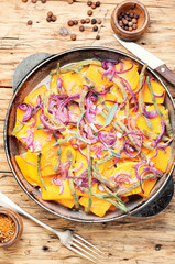 Baked pumpkin slices in pan