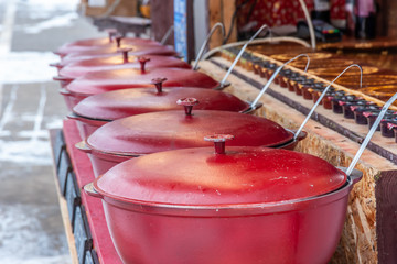 Mulled wine in buckets on New Year's holiday.