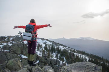 woman on the top of mountain