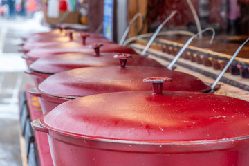 Mulled wine in buckets on New Year's holiday.
