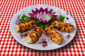 Chicken kebab with onion adn green vegetables