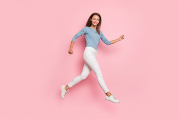 Full length body size side profile photo of cheerful positive cute pretty nice girlfriend running jumping isolated pastel color background