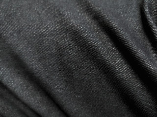 Background gene, black fabric background, close-up