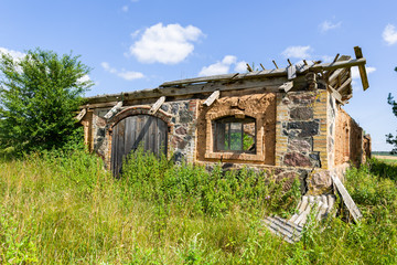 Ruined Building. Abandoned house of brick and stone
