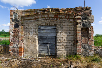 Ruined Building. Abandoned house of brick and stone