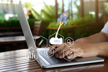 SEO Search Engine Optimization concept with laptop computer. ranking traffic on website, internet...