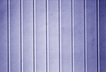 Plastic siding surface in blue tone.