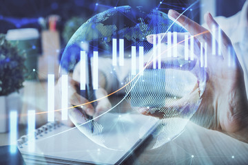 Forex chart displayed on woman's hand taking notes background. Concept of research. Multi exposure