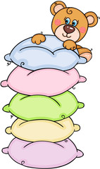 Teddy bear peeking on stack of pillows