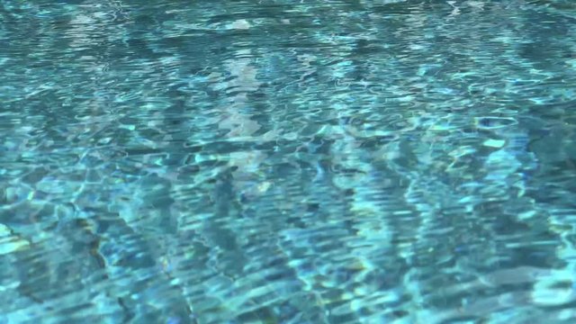 reflection blue water in swimming pool absrtact background