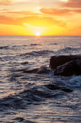 Naklejka premium Caspian Sea at sunset. Rocky coast.