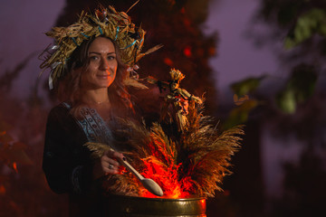 Woman sitting in burning pentagram circle, magic.