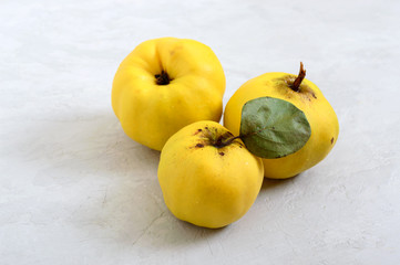 Ripe quince on a light background.