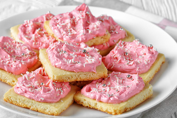 shortbread cookies with pink frosting, top view