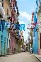 Fototapeta na wymiar Clothes washed are dried on a rope in the street of Cuba