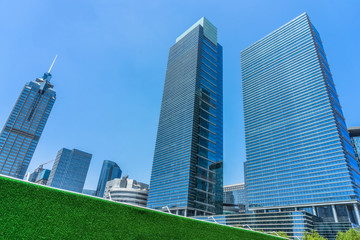 Fototapeta premium low angle view of skyscrapers in city of China.