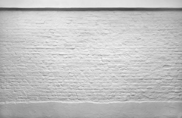 weisse Backsteinmauer Ziegelmauer Hintergrund  .
