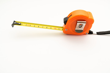 orange plastic construction tape measure on white background