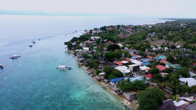 Top view of sandy beach and the Sumilon island beach landing near Oslob, Cebu, Philippines.	