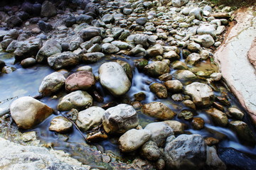water flowing through the rocks