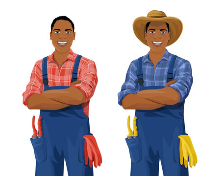 Cartoon African American farmer wearing checkered shirt, overall and hat stands with arm crossed. Smiling gardener with work gloves and hand pruners in his pocket. Vector isolated on white background.