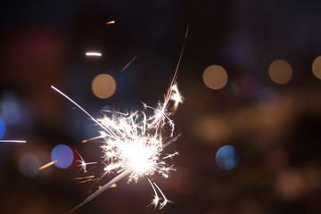 Bengal fire sparkles isolated on black background 