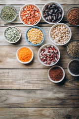 Super food. seeds and beans assortment on a rustic background. top view copy space. Vegetarians.