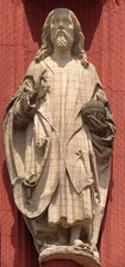 Fototapeta na wymiar Christ the Saviour statue on the portal of the Marienkapelle in Wurzburg, Bavaria, Germany