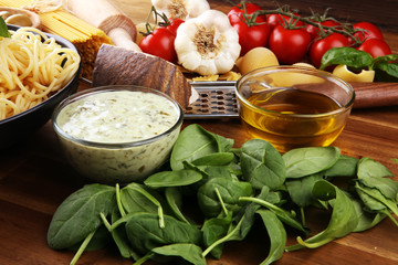 Spaghetti with gorgonzola and spinach souce with ingredients