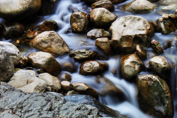 water flowing through the rocks
