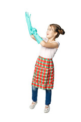 Little girl in green rubber gloves ready for cleaning, pulls the glove over  hand isolated on a white background.