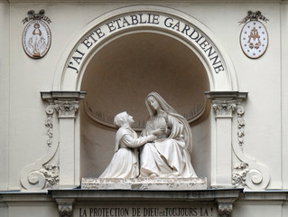 Statue of St Catherine and the Virgin Mary outside the Chapelle Notre Dame de la Medaille...