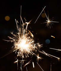 Bengal fire sparkles isolated on black background 