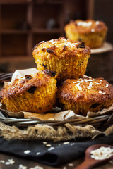 Fresh homemade delicious apple and carrot muffins with dried fruits and nuts