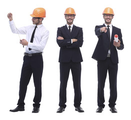 in full growth .successful architect engineer in orange helmet.