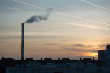 smoke from chimney on blue sky