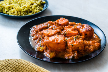 Indian Food Paneer Butter Tikka Masala / Cheese Cottage Curry and Jeera Zira Rice Basmati Pilaf or Pilav.
