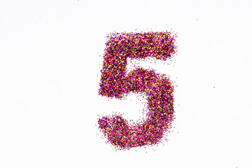 Figure 5 of bright sequins on white background