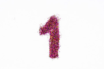 Figure 1 of bright sequins on white background
