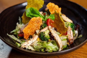 Fresh vegetable salad with chicken fillet. 